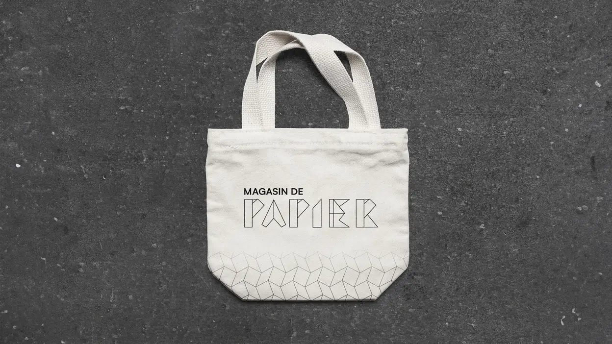 a tote-bag with the new identity of an art gallery